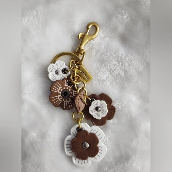 Designer Inspired Brown and White Floral Keychain with Gold Hardware Bag Charm - Picture 1 of 5